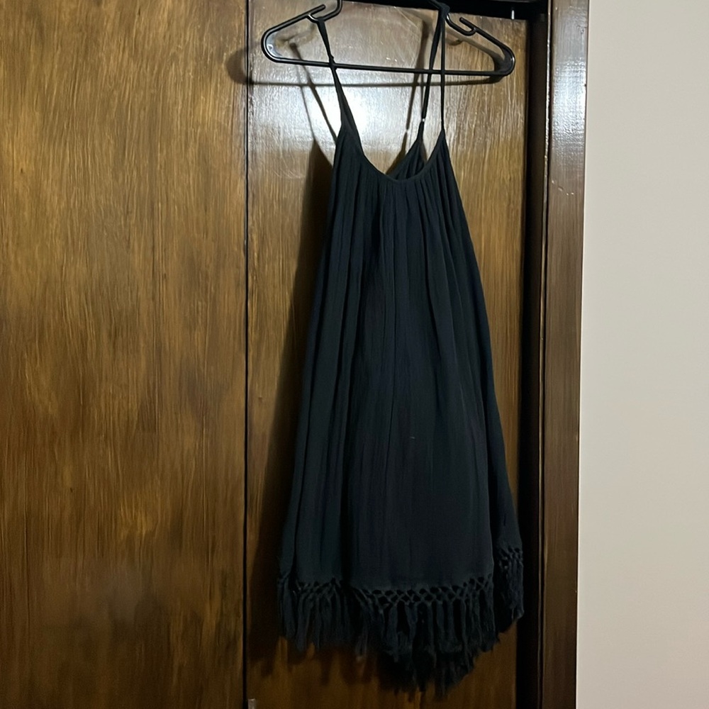 Volcom dress with a fringe hem and spaghetti straps